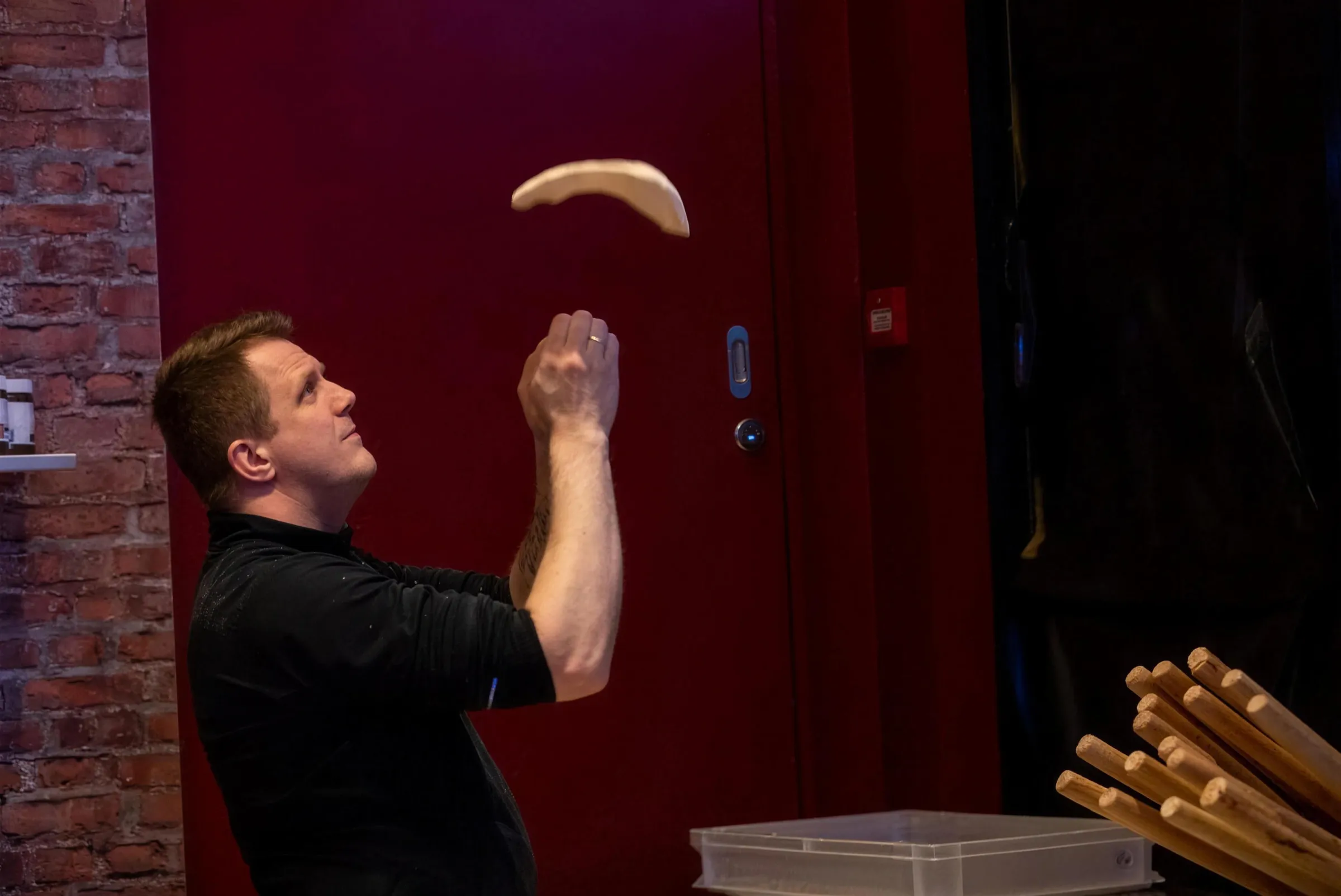 Tossing the dough